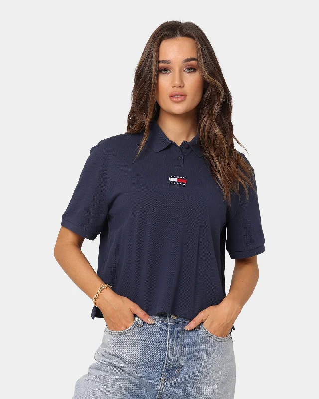 Tommy Jeans Women's Centre Badge Short Sleeve Polo Twilight Navy Fashionable Frayed Hem Denim Tommy Jeans Women's Centre Badge Short Sleeve Polo Twilight Navy Fashionable Frayed Hem Denim